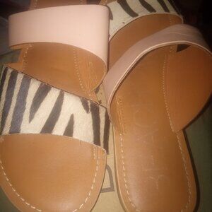 These Sleek Coastal Zebra/Cowhair Sandals are beautiful for any occasion!